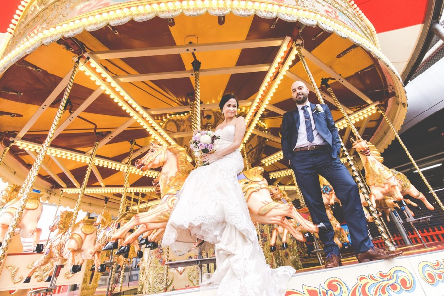 8 gorgeous Sydney Harbour weddings Caesar and Simon tapped into their fun sides at Luna Park. Image: