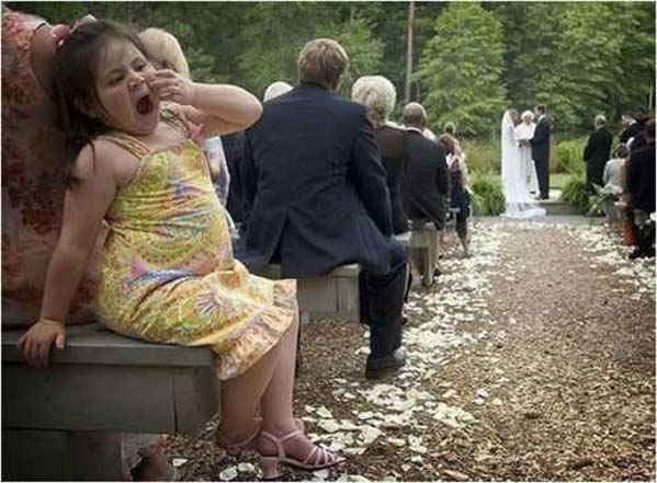 tired child wedding photo bomb