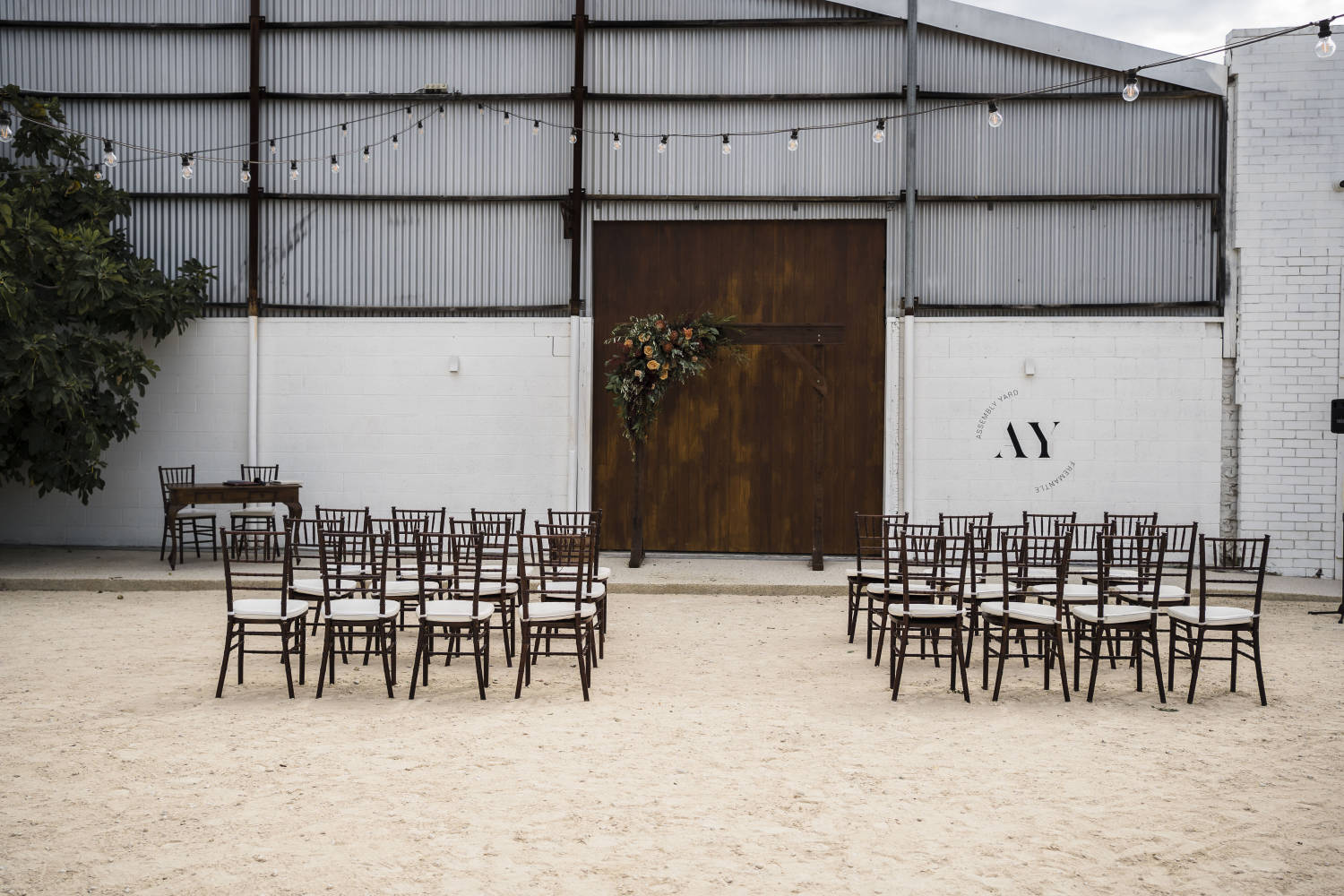 Rustic warehouse wedding at Assembly Yard Fremantle, Perth. Photos by Paul Winzar. Eloise & Liam.