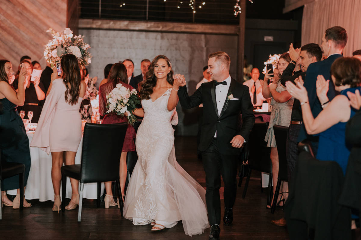 Romantic, elegant, classic style for Lana and Peter at their Cargo Hall wedding by Showtime Event Group at South Wharf, Melbourne.