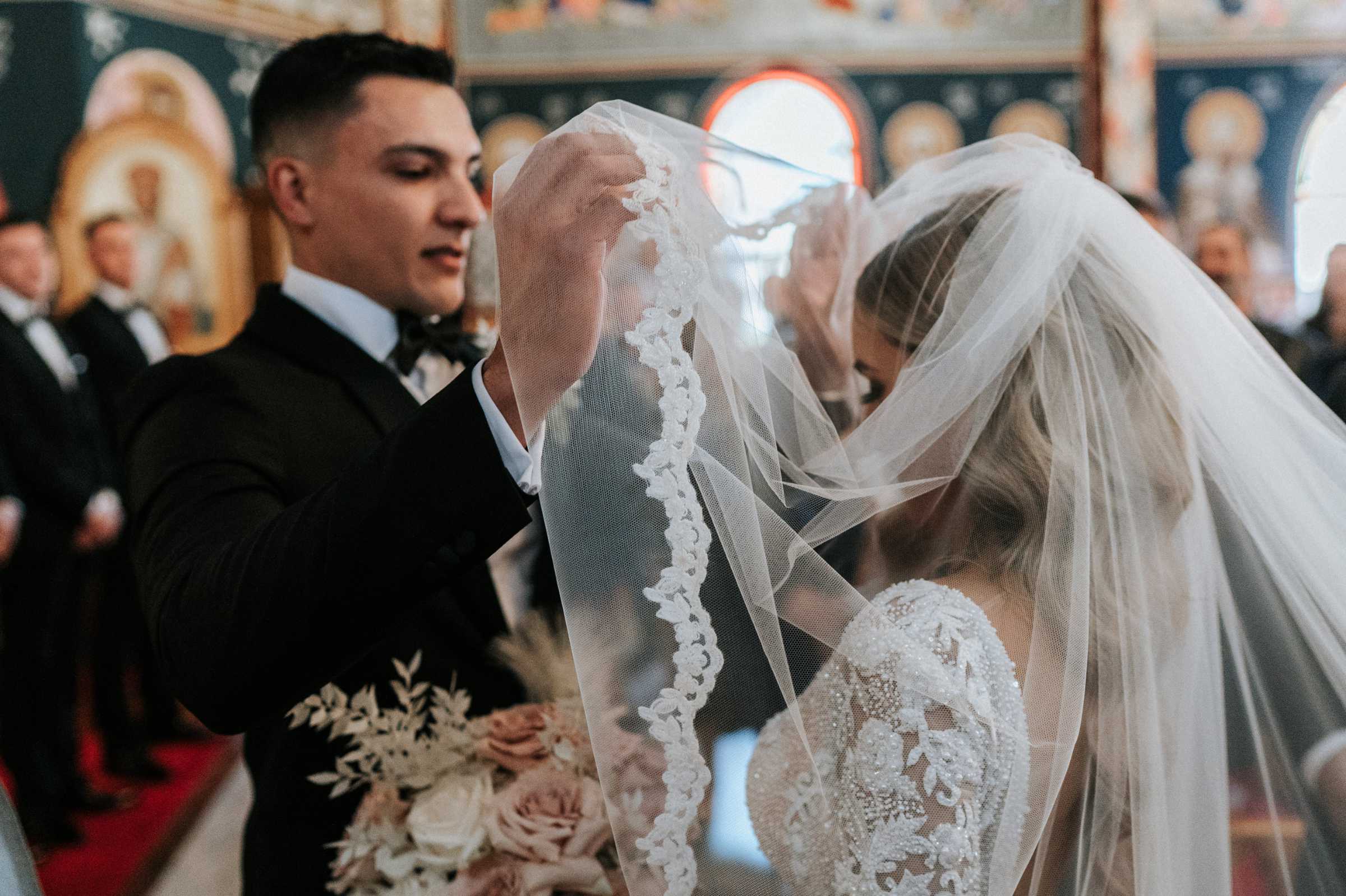 Doltone House Jones Bay Wharf Sydney wedding, Riannon and Mitch, groom lifting the veil, photo by The Evoke Company