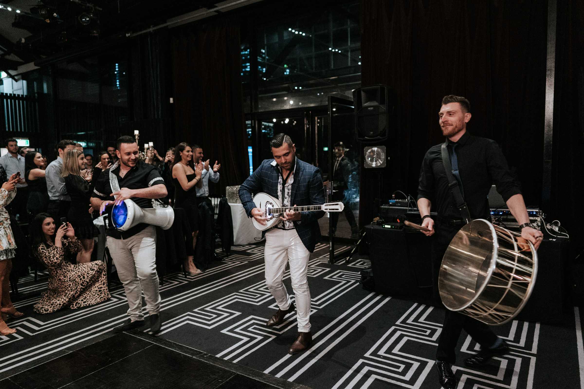 Doltone House Jones Bay Wharf Sydney wedding, Riannon and Mitch, Tommy Tsonis bouzouki player, photo by The Evoke Company