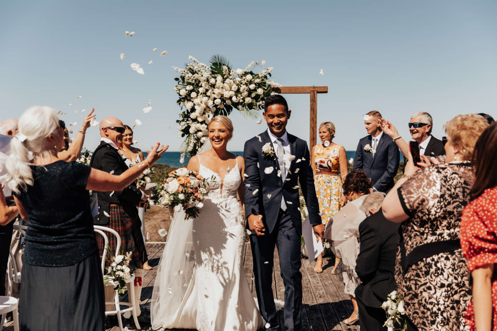 Luxe coastal wedding for Maddi and Dan at Caves Coastal Bar & Bungalows near Newcastle, NSW. Images by Tatiana Rose Photography.