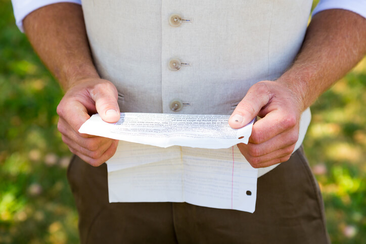 Groom Reading Vows for Wedding