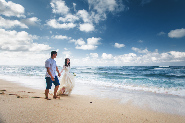 Wedding couple just married at the beach, Bali. Wedding ceremony