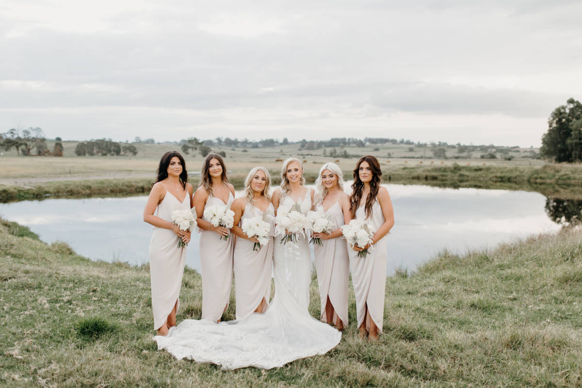 Champagne bridesmaid dresses at Marissa & Luke's Burnham Grove Estate wedding. Photo by Lightheart Films & Photography