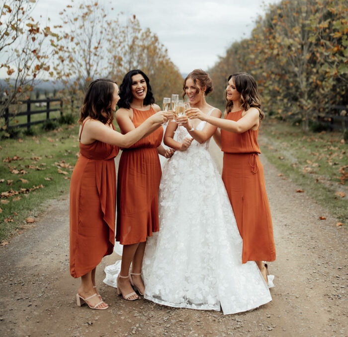 Copper coloured bridesmaid dresses at Ella and John's Stones of the Yarra Valley wedding