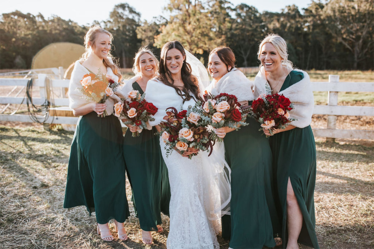 emerald green bridesmaids dresses at Sophie & Tim's Woods Farm wedding. Image by Neaton Photography.
