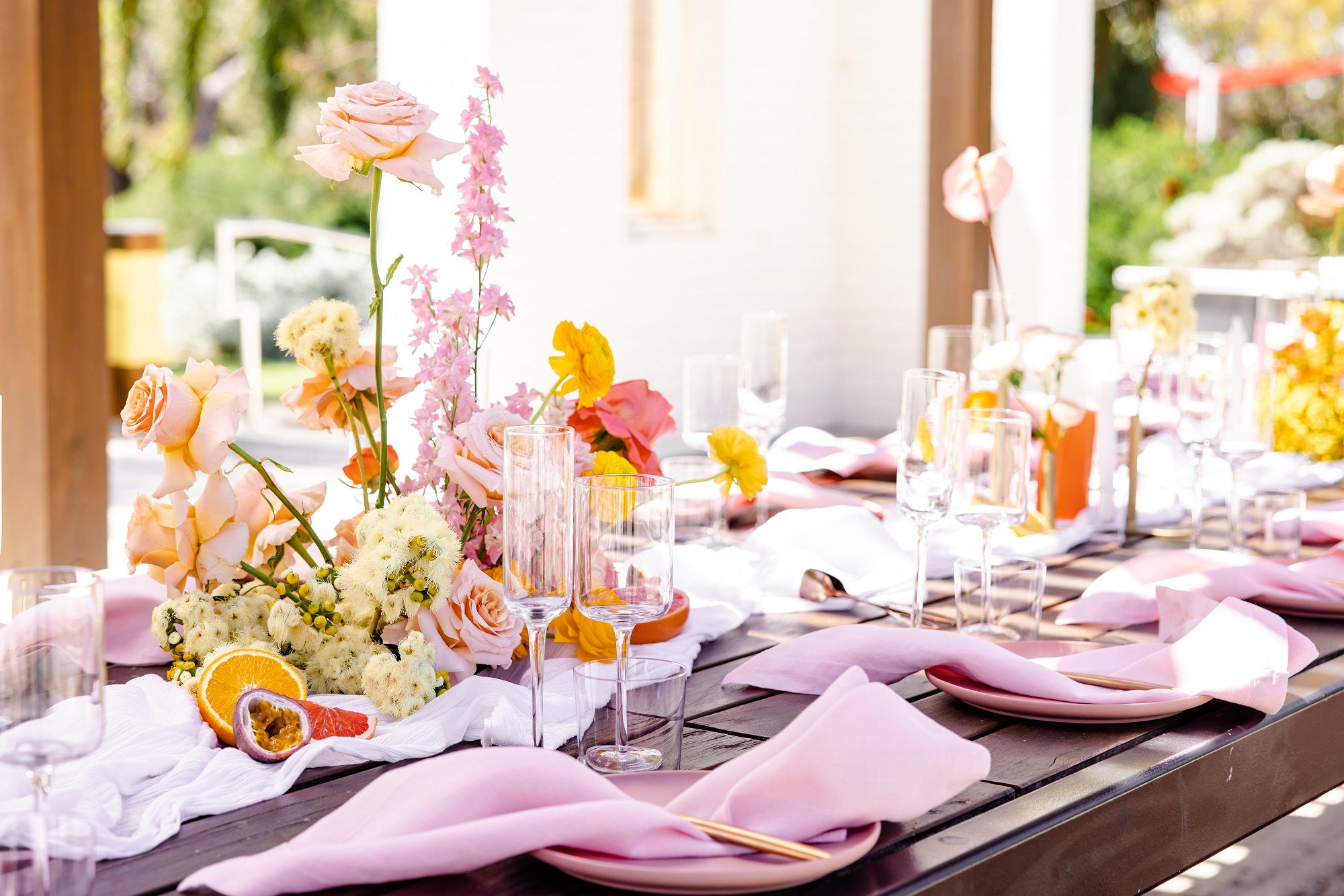 Wedding styling trends to watch in 2023, bright citrus wedding styling