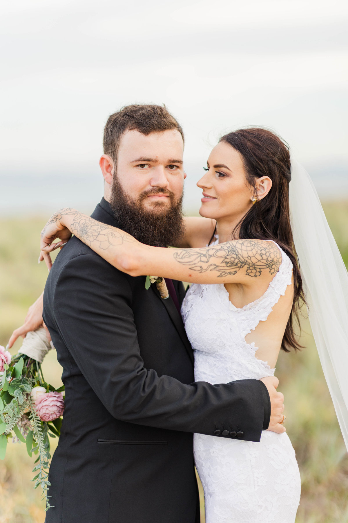 Keirra and Andrew's Breakwater Bar and Restaurant wedding photographed by Alyce Holzy