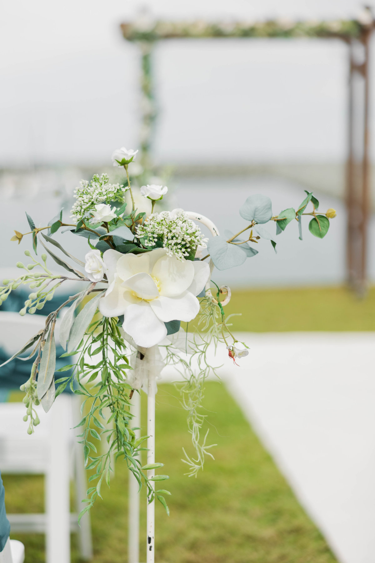 Keirra and Andrew's Breakwater Bar and Restaurant wedding photographed by Alyce Holzy