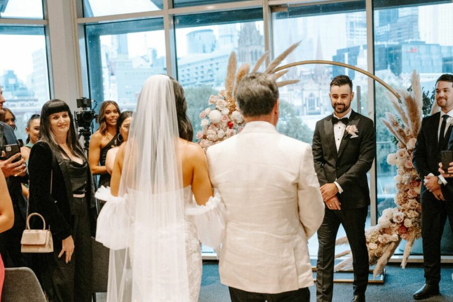 Khiara walks down the aisle to Daniel at Metropolis Events. 