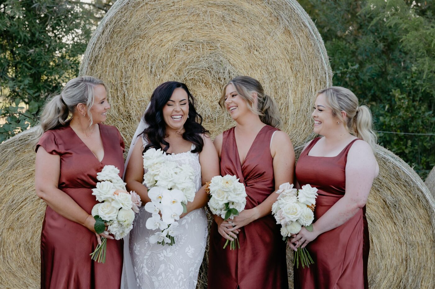 Deep pink bridesmaid dresses at Kristy and Daniel's Acacia Ridge Winery wedding 